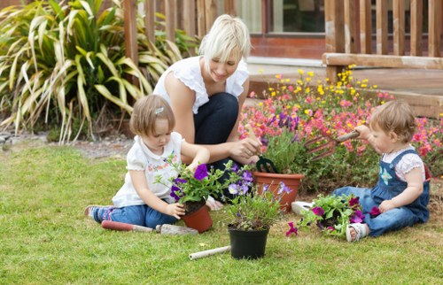 Gardeners discussing corrective work at the end of a project